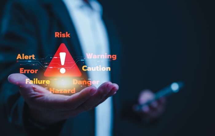 Risk management concept showing hazard warning and compliance levels